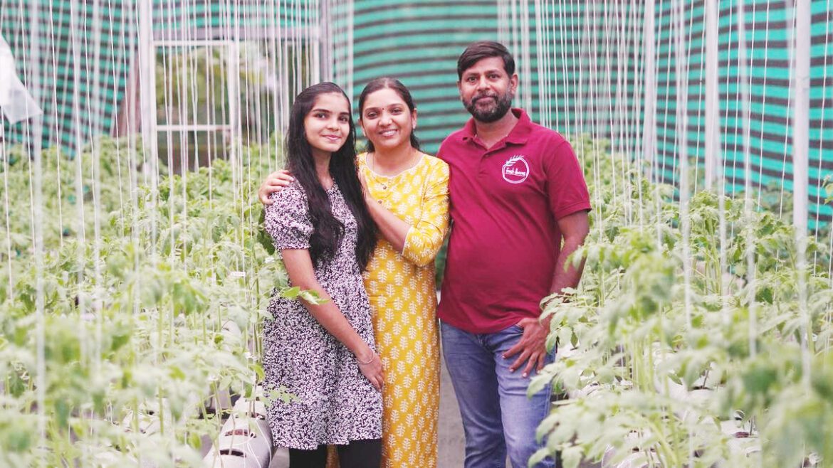 Santosh Kumar S with his family in his farm